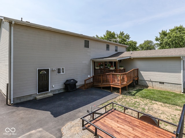 730 N Forsythe St, Franklin, IN 46131 - back of house featuring a wooden deck, a patio, and crawl space