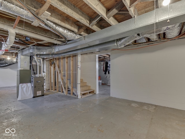 730 N Forsythe St, Franklin, IN 46131 - unfinished basement featuring heating unit and stairs