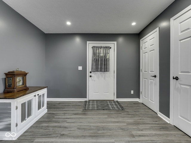 730 N Forsythe St, Franklin, IN 46131 - foyer entrance with wood finished floors, baseboards, and recessed lighting