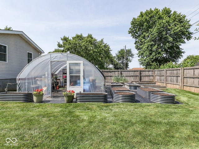 730 N Forsythe St, Franklin, IN 46131 - view of yard with a greenhouse, a vegetable garden, and an outdoor structure