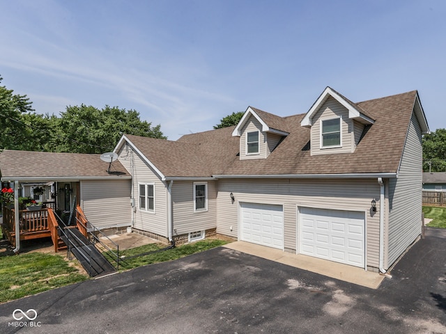 730 N Forsythe St, Franklin, IN 46131 - cape cod-style house with driveway, roof with shingles, and an attached garage