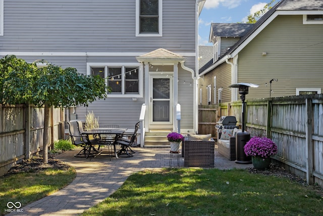 2016 Central Ave, Indianapolis, IN 46202 - back of house featuring entry steps and a patio