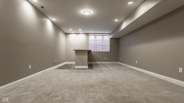 2016 Central Ave, Indianapolis, IN 46202 - spare room with carpet, recessed lighting, baseboards, and a bar
