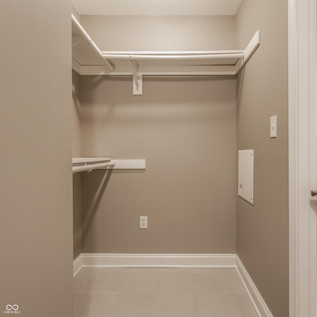 2016 Central Ave, Indianapolis, IN 46202 - walk in closet featuring light tile patterned floors