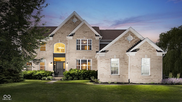 3876 Kegler Way, Carmel, IN 46074 - traditional-style house featuring a yard and brick siding