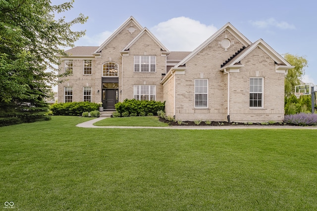 3876 Kegler Way, Carmel, IN 46074 - view of front of house featuring brick siding and a front lawn