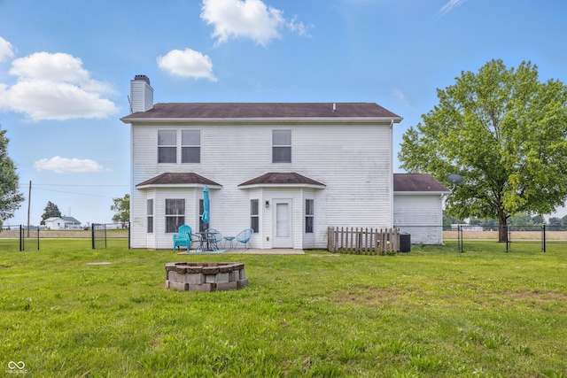 5030 E 800 N, Columbus, IN 47203 - rear view of house with a chimney, an outdoor fire pit, and a patio area