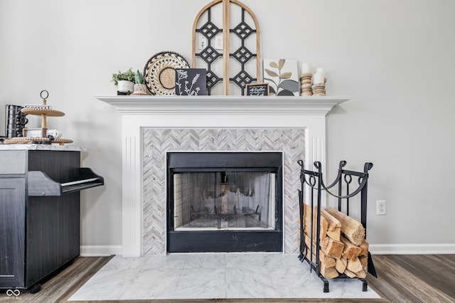 5030 E 800 N, Columbus, IN 47203 - detailed view of a tiled fireplace, wood finished floors, and baseboards