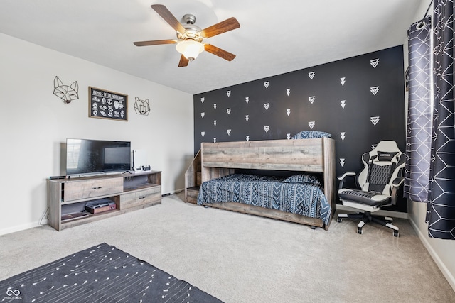 5030 E 800 N, Columbus, IN 47203 - bedroom featuring carpet flooring, an accent wall, baseboards, and a ceiling fan