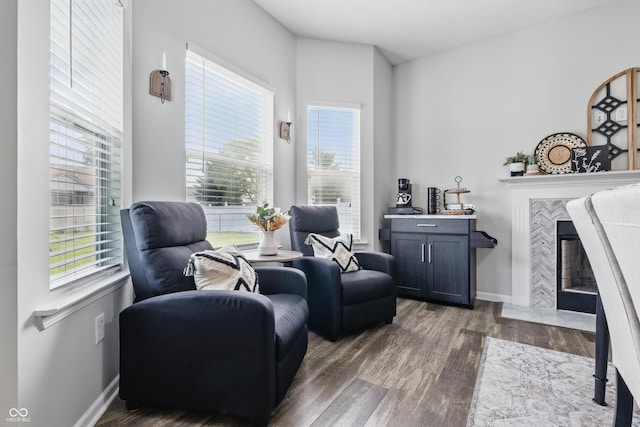 5030 E 800 N, Columbus, IN 47203 - living area with dark wood-style flooring, a fireplace, and baseboards