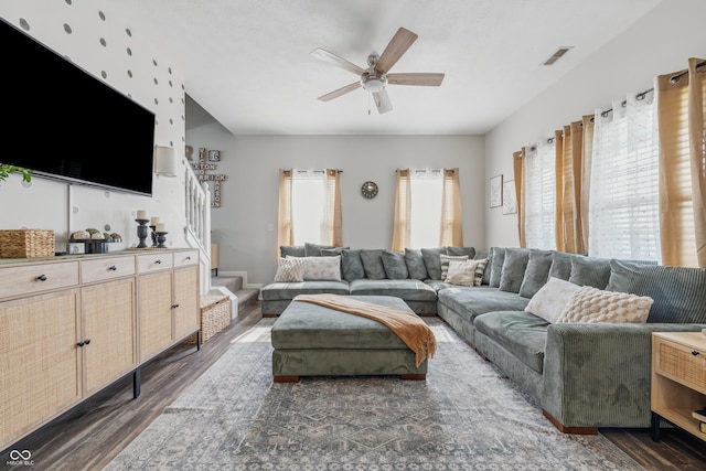 5030 E 800 N, Columbus, IN 47203 - living area featuring healthy amount of natural light, dark wood-type flooring, and stairs