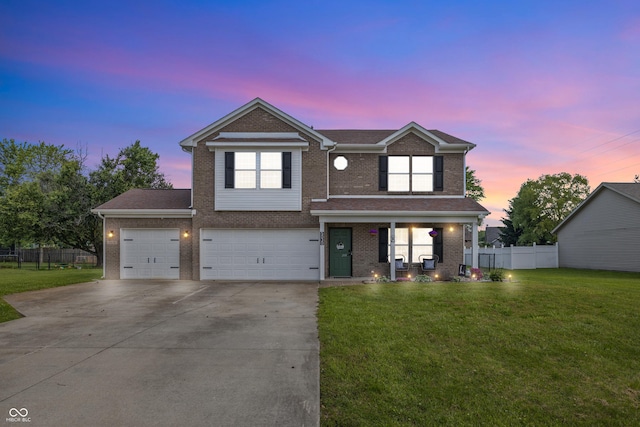 5030 E 800 N, Columbus, IN 47203 - traditional-style home featuring brick siding, concrete driveway, a porch, an attached garage, and a shingled roof