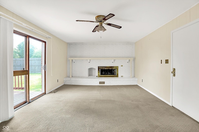 13172 E 116th St, Fishers, IN 46037 - unfurnished living room featuring ceiling fan, a fireplace, carpet floors, and baseboards