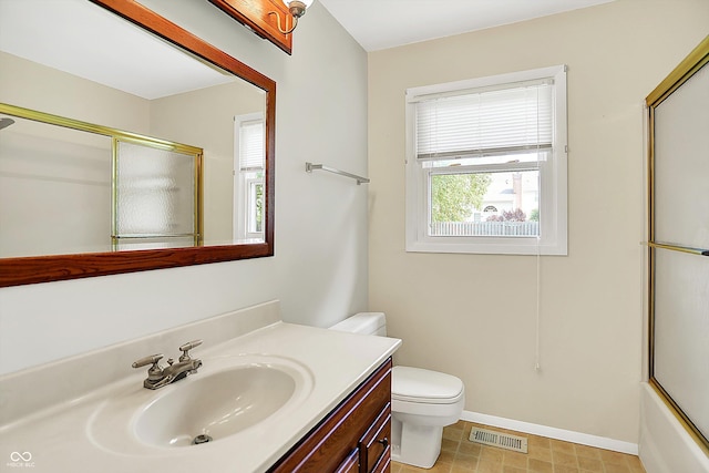 13172 E 116th St, Fishers, IN 46037 - bathroom featuring toilet, vanity, baseboards, and enclosed tub / shower combo