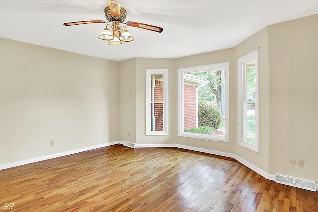 13172 E 116th St, Fishers, IN 46037 - unfurnished room with hardwood / wood-style floors, baseboards, and a ceiling fan