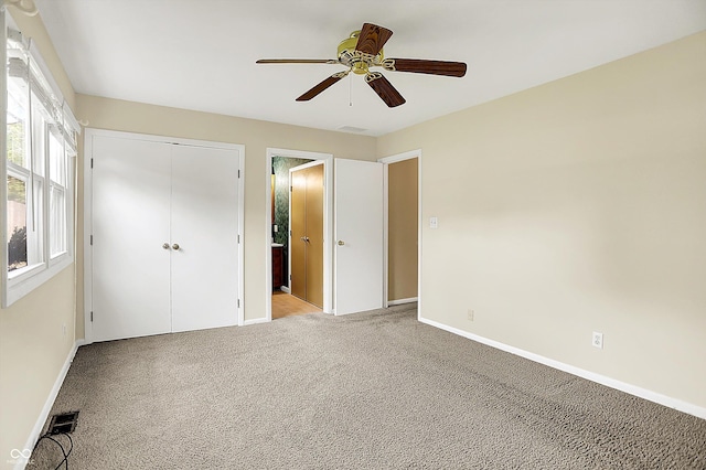 13172 E 116th St, Fishers, IN 46037 - unfurnished bedroom with light carpet, baseboards, a closet, and a ceiling fan