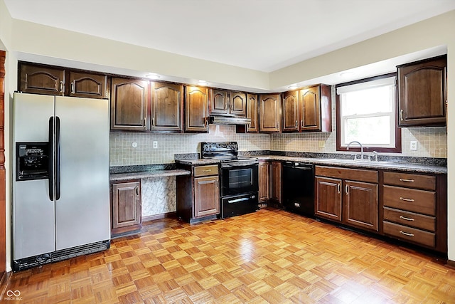 13172 E 116th St, Fishers, IN 46037 - kitchen with black appliances, dark countertops, a sink, and exhaust hood