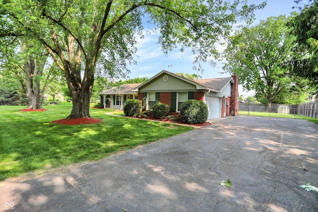 13172 E 116th St, Fishers, IN 46037 - single story home with asphalt driveway, brick siding, a garage, and a chimney