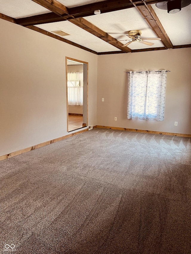 514 W 6th St, Sheridan, IN 46069 - spare room with a ceiling fan, carpet flooring, beam ceiling, baseboards, and coffered ceiling
