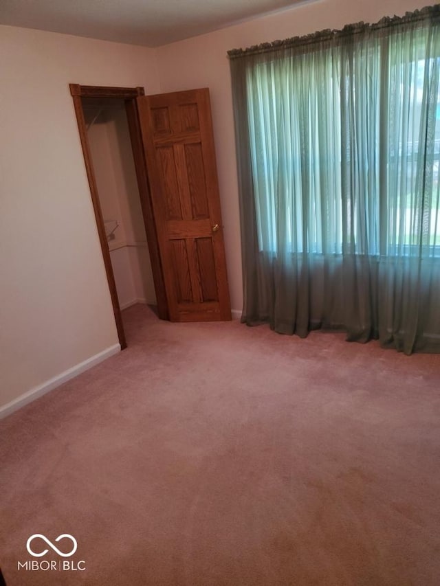 1322 Greenway Dr, Anderson, IN 46011 - empty room with light colored carpet and baseboards