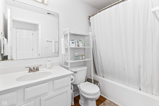 2326 Gradison Cir, Indianapolis, IN 46214 - bathroom featuring vanity, toilet, and shower / tub combo with curtain