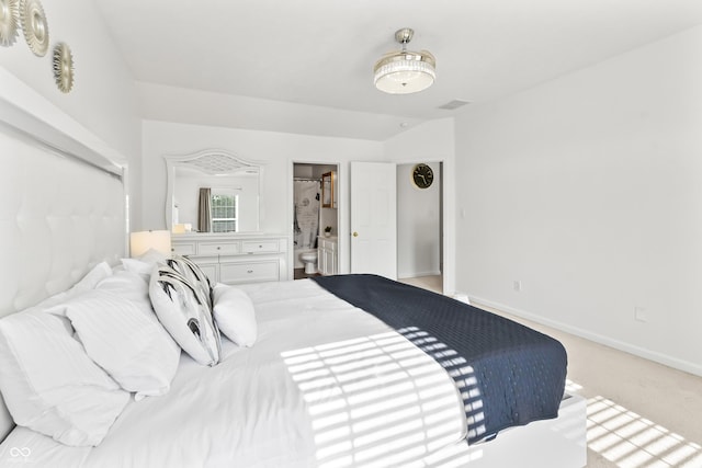 2326 Gradison Cir, Indianapolis, IN 46214 - carpeted bedroom with baseboards and ensuite bathroom