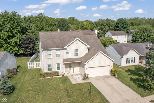 2326 Gradison Cir, Indianapolis, IN 46214 - view of front of property featuring driveway, an attached garage, and a shingled roof