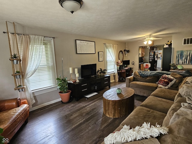 29 Home Ave, Markleville, IN 46056 - living room featuring a ceiling fan, dark wood-type flooring, and baseboards