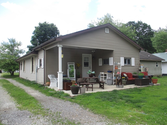 29 Home Ave, Markleville, IN 46056 - rear view of house with a patio area and a yard