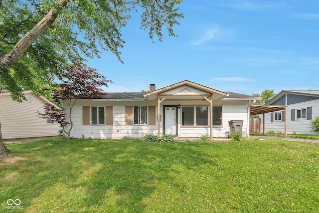 3242 Welch Dr, Indianapolis, IN 46224 - single story home featuring a front lawn and an attached carport