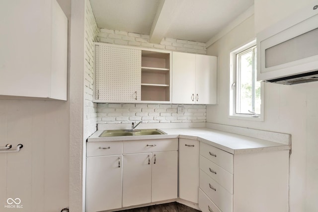 3242 Welch Dr, Indianapolis, IN 46224 - kitchen featuring white microwave, a sink, open shelves, light countertops, and white cabinetry