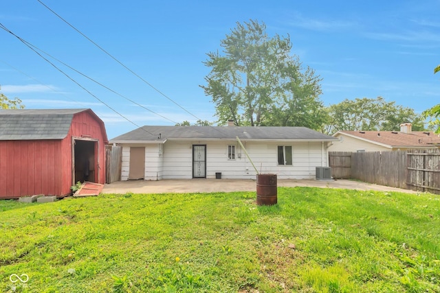 3242 Welch Dr, Indianapolis, IN 46224 - rear view of house featuring a patio area and central air condition unit