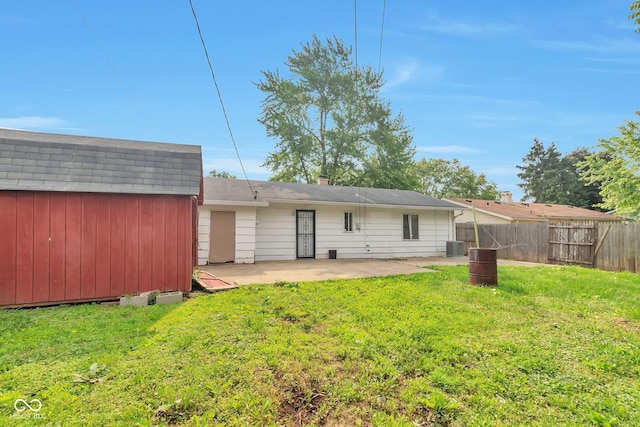 3242 Welch Dr, Indianapolis, IN 46224 - rear view of house featuring a patio area