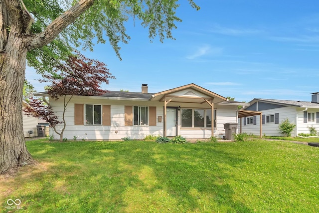 3242 Welch Dr, Indianapolis, IN 46224 - ranch-style house featuring a front yard and a chimney