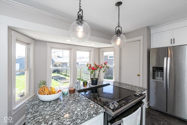 831 Weghorst St, Indianapolis, IN 46203 - kitchen with stainless steel fridge, electric stove, white cabinetry, pendant lighting, and ornamental molding