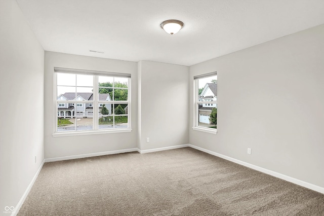 6762 Brentwood Ct, Brownsburg, IN 46112 - empty room with carpet flooring and baseboards