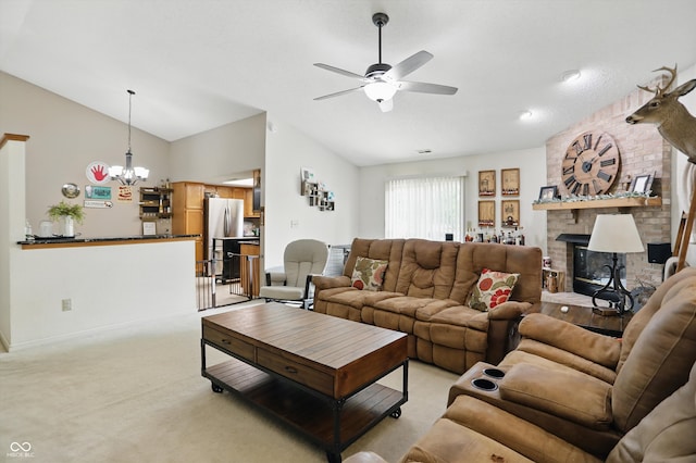 2145 W Autumn Ln, Columbus, IN 47201 - living room featuring vaulted ceiling, ceiling fan, a brick fireplace, a chandelier, and light carpet