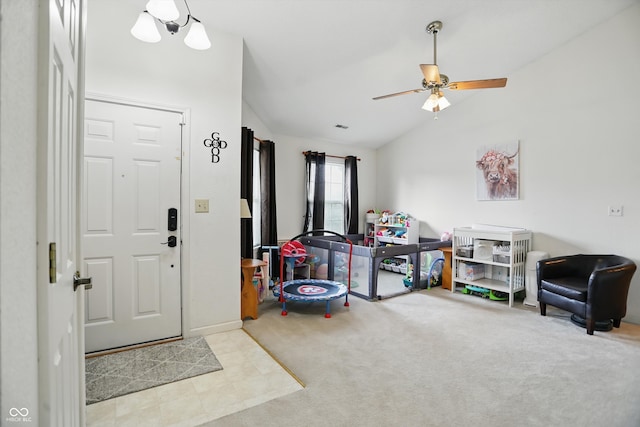 2145 W Autumn Ln, Columbus, IN 47201 - entryway featuring lofted ceiling, a ceiling fan, and carpet floors