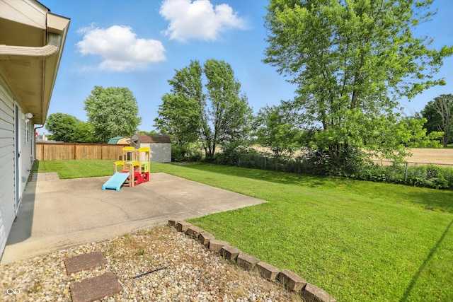 2145 W Autumn Ln, Columbus, IN 47201 - view of yard with a patio and a playground