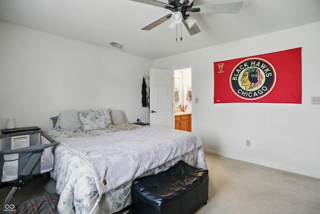 2145 W Autumn Ln, Columbus, IN 47201 - bedroom featuring light colored carpet, baseboards, and a ceiling fan