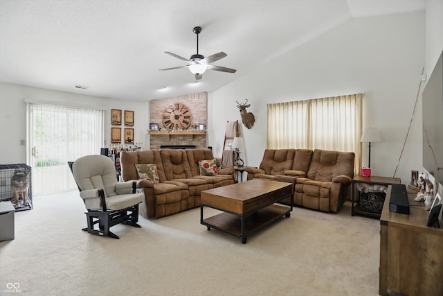 2145 W Autumn Ln, Columbus, IN 47201 - living area featuring lofted ceiling, light colored carpet, ceiling fan, and a brick fireplace