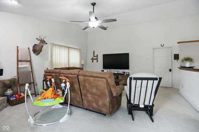 2145 W Autumn Ln, Columbus, IN 47201 - living room with lofted ceiling, light carpet, and ceiling fan