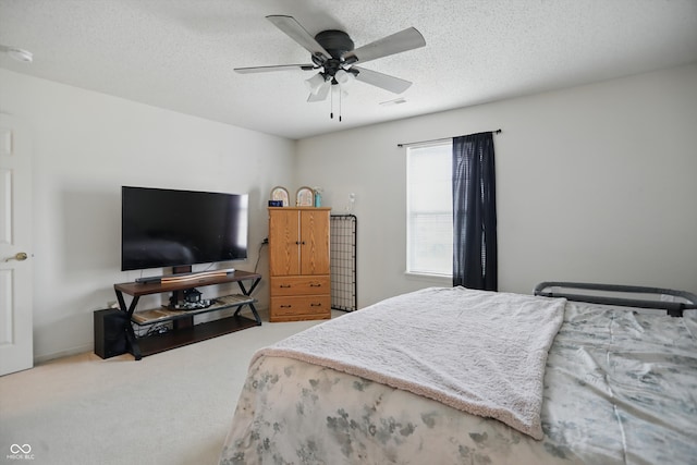2145 W Autumn Ln, Columbus, IN 47201 - bedroom with carpet floors, ceiling fan, and a textured ceiling