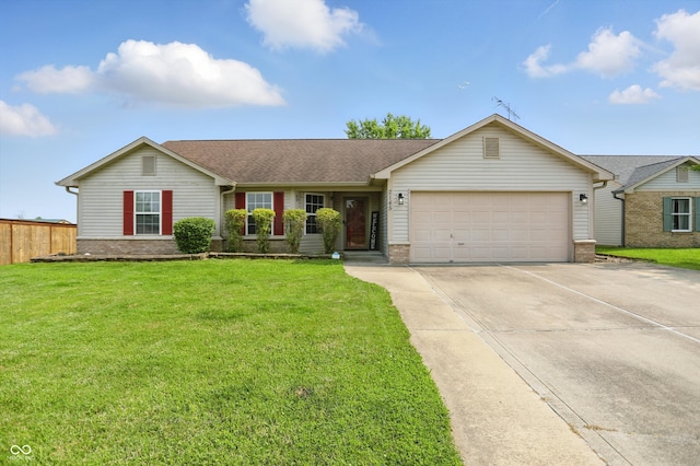 2145 W Autumn Ln, Columbus, IN 47201 - ranch-style home featuring a garage, driveway, brick siding, and roof with shingles
