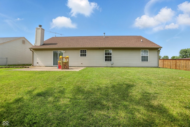 2145 W Autumn Ln, Columbus, IN 47201 - back of house with a patio and a chimney
