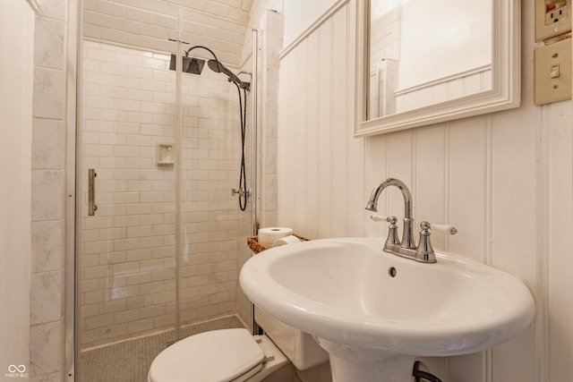 224 N Pennsylvania St, Greenfield, IN 46140 - full bath with a stall shower, a sink, toilet, and a decorative wall