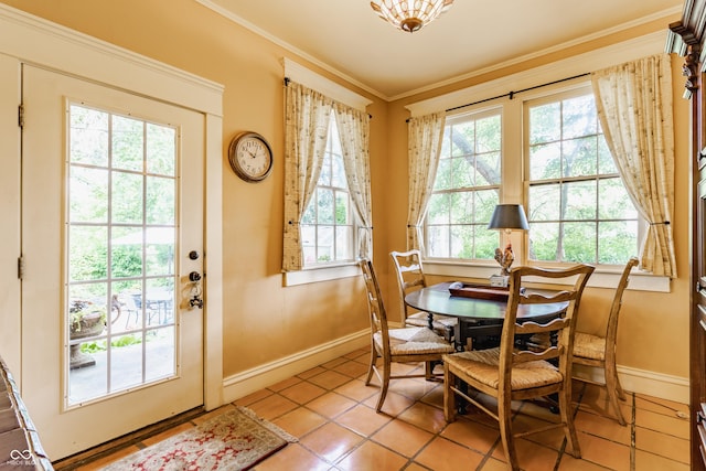 224 N Pennsylvania St, Greenfield, IN 46140 - dining room with light tile patterned floors, baseboards, and ornamental molding