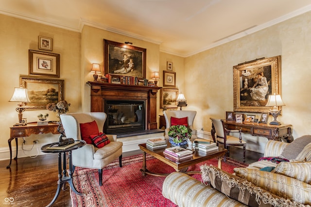 224 N Pennsylvania St, Greenfield, IN 46140 - living area with wood finished floors, a glass covered fireplace, ornamental molding, and baseboards