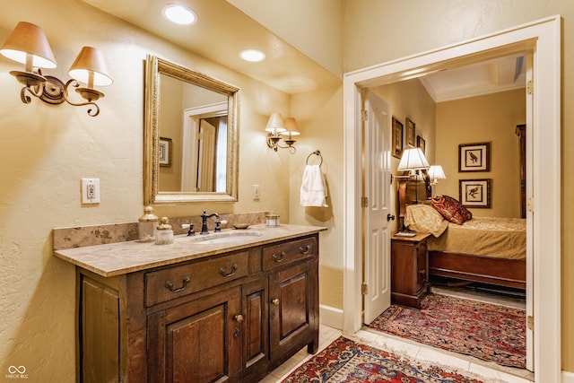 224 N Pennsylvania St, Greenfield, IN 46140 - bathroom with vanity, tile patterned flooring, crown molding, and a textured wall