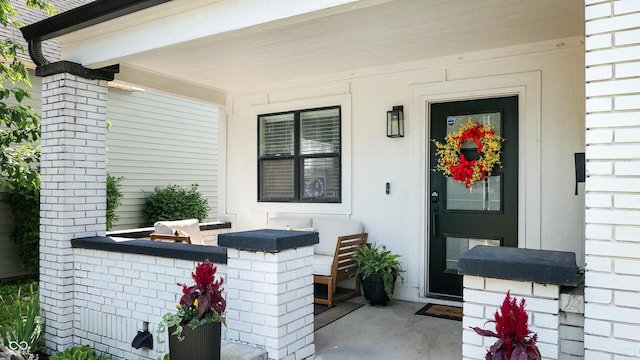 615 Orange St, Indianapolis, IN 46203 - property entrance with a porch